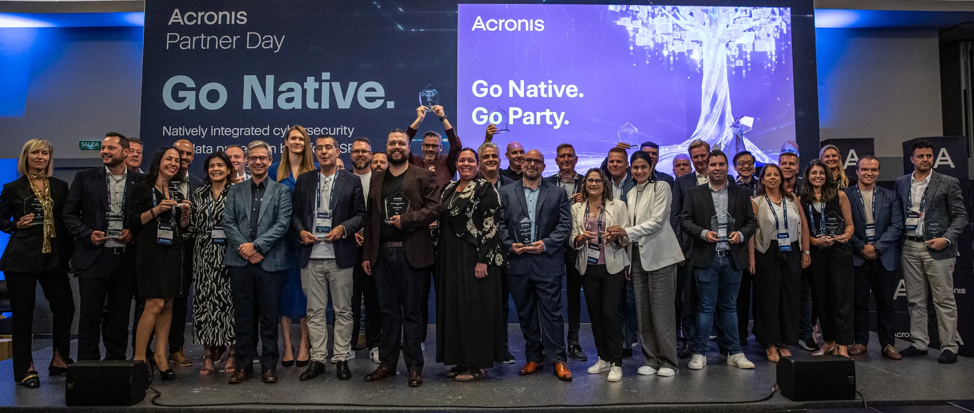 All the recipients of the #CyberFit award at Acronis Partner Day in Barcelona with Dan Boufarhat, director of IT First Responder pictured at the back.