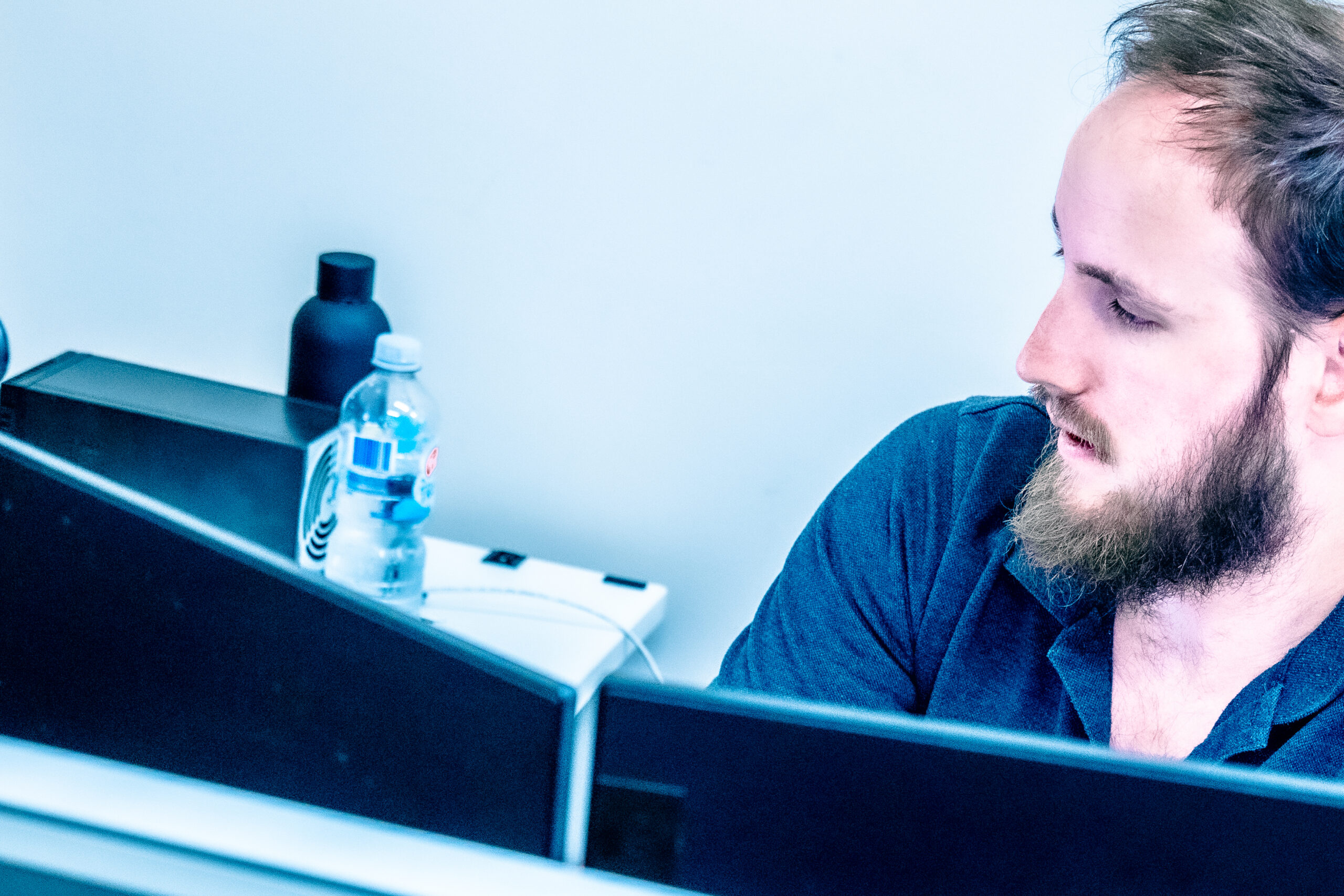 Michael Mowbray at work on his desk